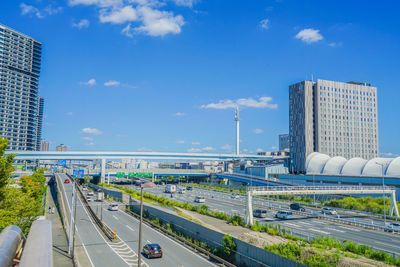 High angle view of buildings in city against sky