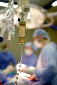 Close-up of iv drip in operating room