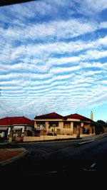 Built structure against cloudy sky