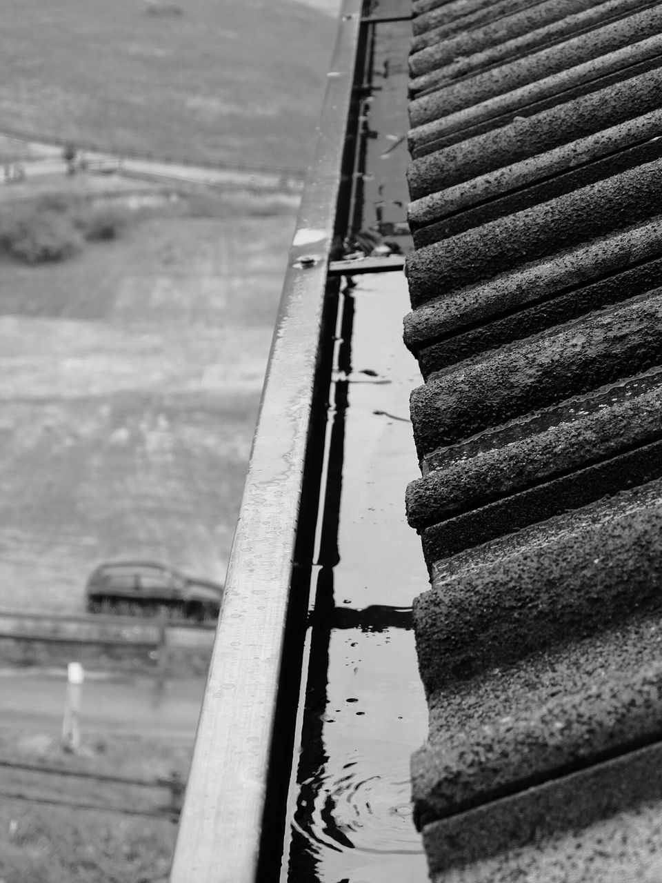 water, built structure, architecture, building exterior, sky, reflection, outdoors, low angle view, railing, sea, day, waterfront, cloud - sky, no people, pier, river, bridge - man made structure, wood - material, connection, nature