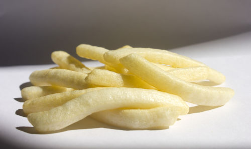 Close-up of yellow bell peppers on table