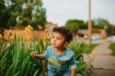 Cute boy looking away outdoors