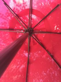 Low angle view of red umbrella