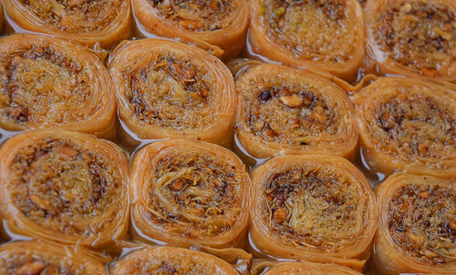 Close-up of baklava s for sale in shop