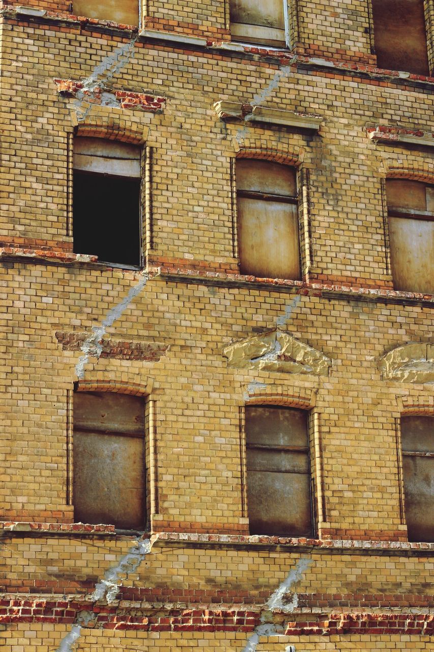 architecture, building exterior, built structure, window, old, history, low angle view, brick wall, full frame, weathered, building, backgrounds, facade, outdoors, exterior, day, no people, arch, the past, pattern