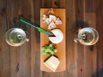 High angle view of wine in glass on table