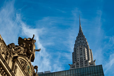 Chrysler building and grand central statues