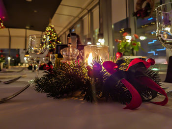 Close-up of illuminated christmas tree on table