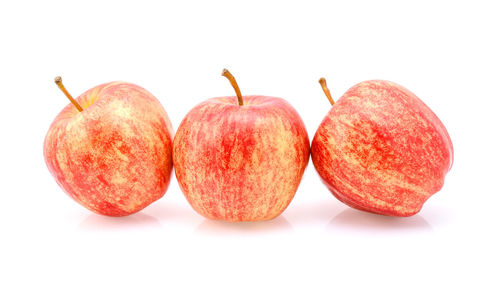 Close-up of apples on white background