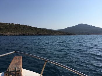 Cropped boat sailing in sea