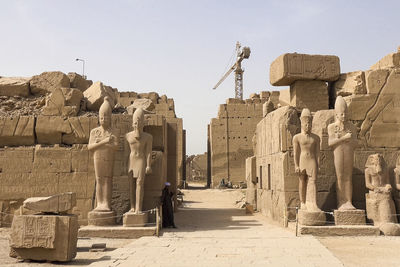 Statue of historic building against clear sky