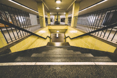 Empty illuminated underground walkway