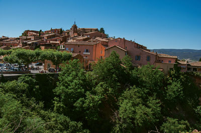 Panoramic view of the roussillon village and surrounding woods, in the french provence.