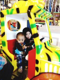 Cute boy playing with toy