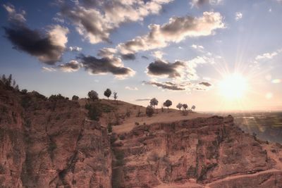 Scenic view of landscape against sky during sunset