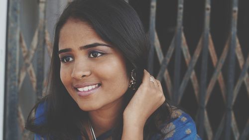 Portrait of smiling young woman