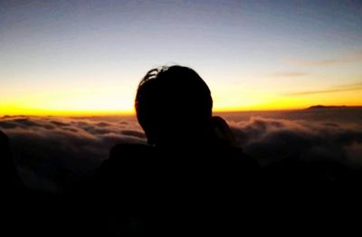Portrait of silhouette man against sky during sunset