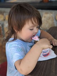 Cute girl holding ice cream