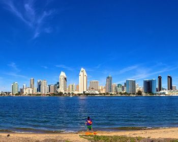 City skyline against blue sky