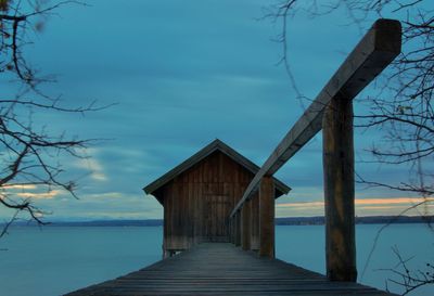 Pier over sea against sky