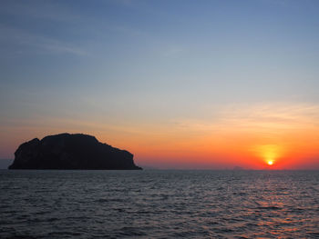 Scenic view of sea against sky during sunset