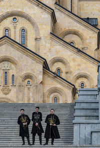 Group of people in front of building