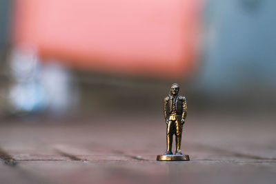 Close-up of statue on table