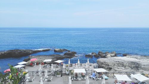 High angle view of beach against blue sky