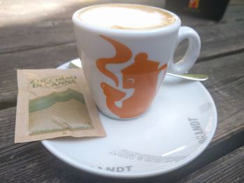 Close-up of coffee cup on table