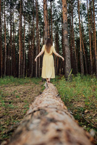 Midsummer solstice ritual. woman with long hair dance on nature background