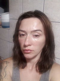 Portrait of beautiful woman at home