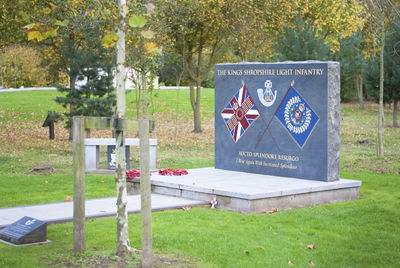 Information sign on field in park