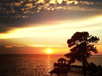 Scenic view of sea at sunset