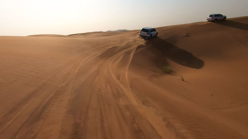 Scenic view of sand dunes in desert