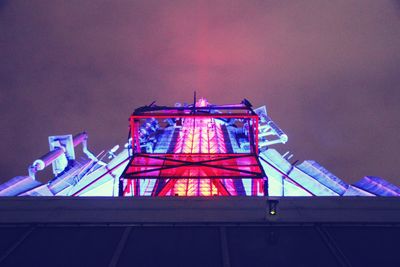 Low angle view of illuminated built structure