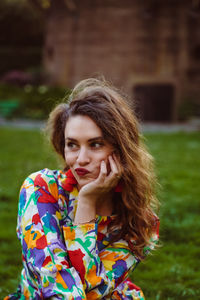 Portrait of beautiful young woman outdoors