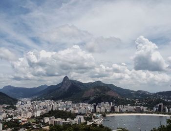 View of city against cloudy sky