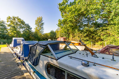 A dyke of moored boats in a quiet backwater