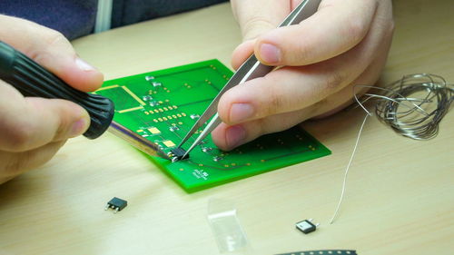 Close-up of person working on table