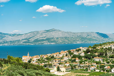 High angle view of townscape by sea against sky in croatia