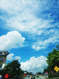 Low angle view of road against cloudy sky