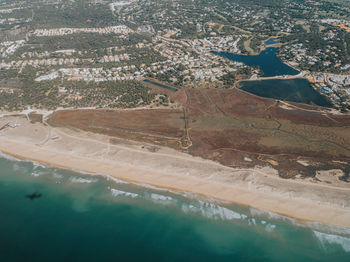 High angle view of sea and land