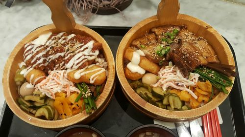 High angle view of food in wooden bowls