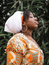 Midsection of woman looking away