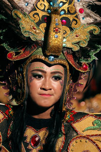 Portrait of smiling woman wearing mask