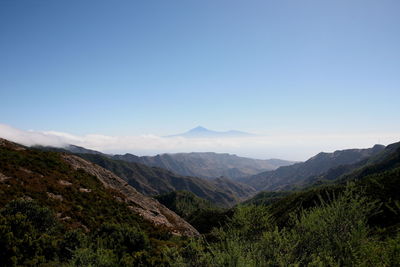 Scenic view of mountains against clear sky