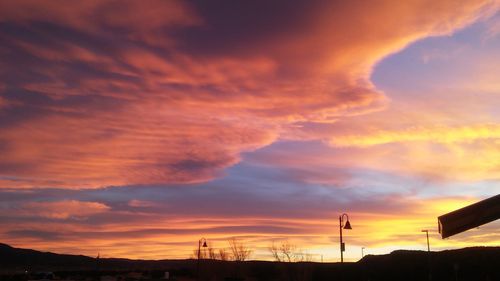 Scenic view of dramatic sky during sunset