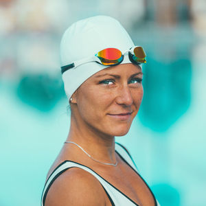 Portrait of woman wearing swimming goggles