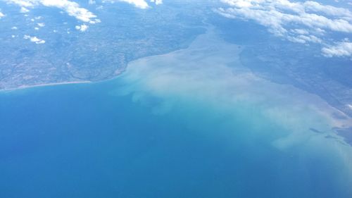 Close-up of blue sea against sky