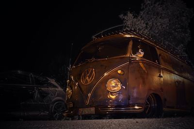 Abandoned car at night